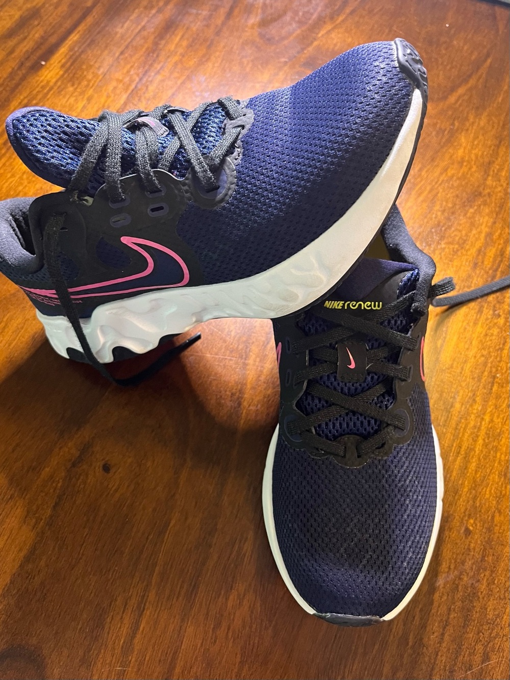 Nike Women's Navy Athletic Shoes with Pink Accents